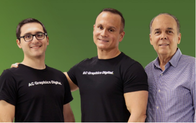 AC Graphics team members in branded shirts representing Miami print and packaging company